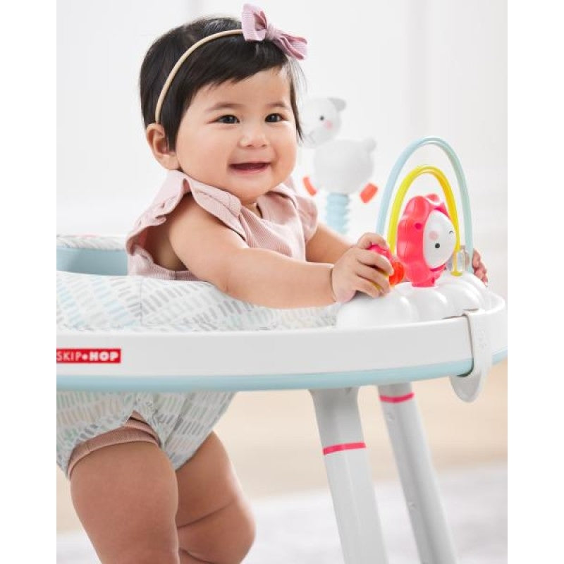 Four clip-on toys on the Skip Hop Silver Lining Cloud Activity Centre — peekaboo clouds, wobble lamb, swaying stars and sun spinner